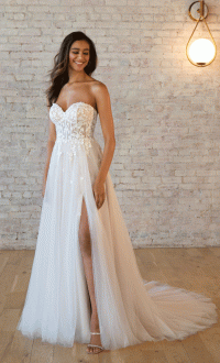Stella York 7560  Boho style wedding dress with appliquéd strapless Sweetheart bodice & thigh high slit in skirt