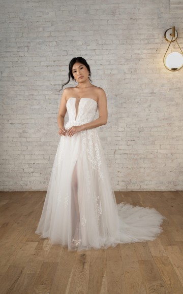 Stella York Tulle Wedding Dress with strapless neckline, Aline skirt with split Stella York collection at Blessings Of Brighton, East Sussex