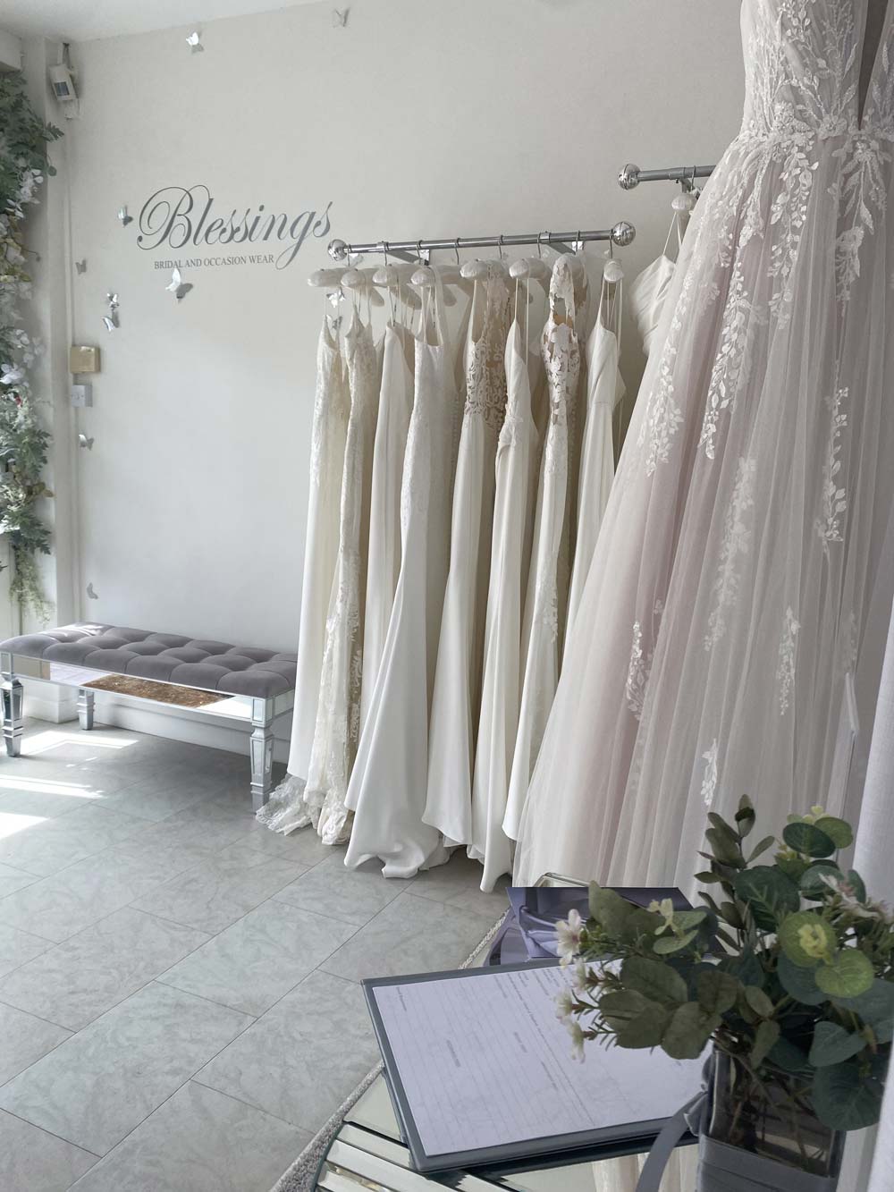 spacious bridal boutique has natural light with a welcoming and elegant feel