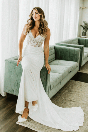 Stella York 7568 Slim fitting Crepe dress with sheer lace V neck bodice - Stella York wedding dress collection at Blessings Of Brighton, E.Sussex BN1 5GG