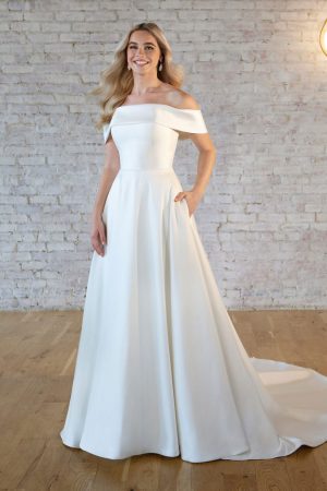 Stella York 7535 Off the shoulder wedding dress with pockets at Blessings Of Brighton