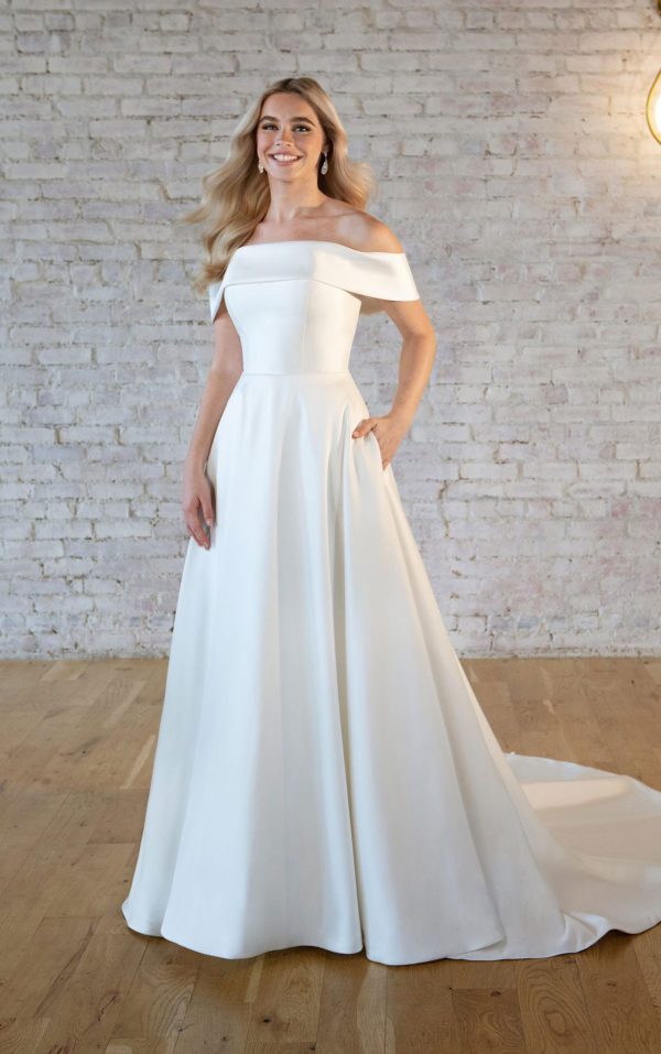 Stella York 7535 Off the shoulder wedding dress with pockets at Blessings Of Brighton