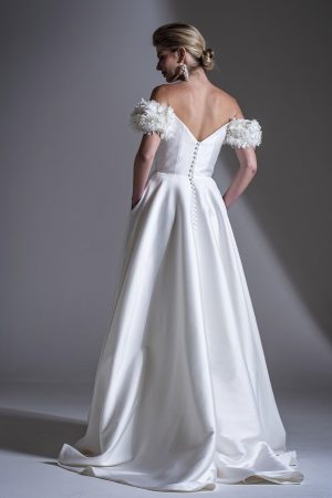 Freda Bennet Romily wedding dress with Aline skirt and pockets available at Blessings Of Brighton